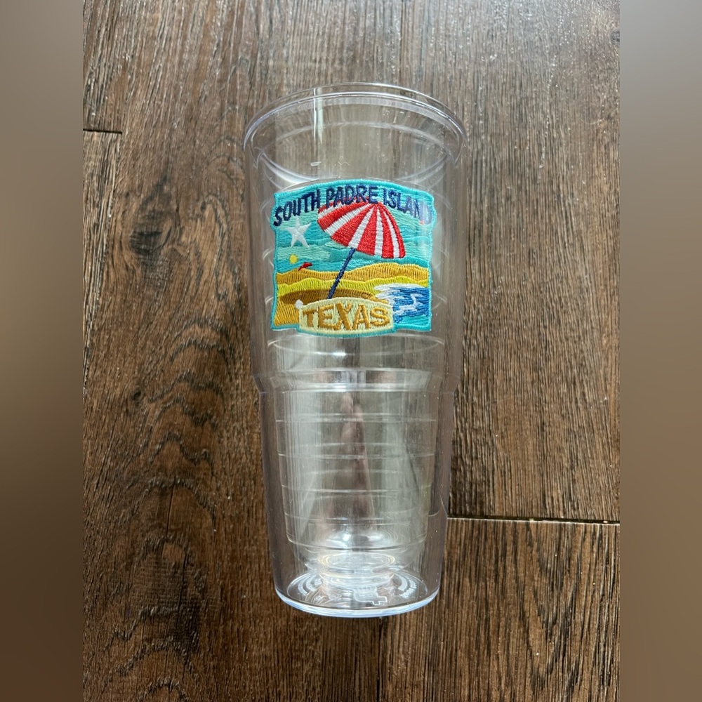 Like new 24 oz South Padre Island Texas TERVIS with a beach scene.  No lid.